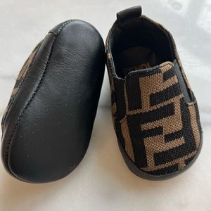 Worn once of twice fendi baby slip ons